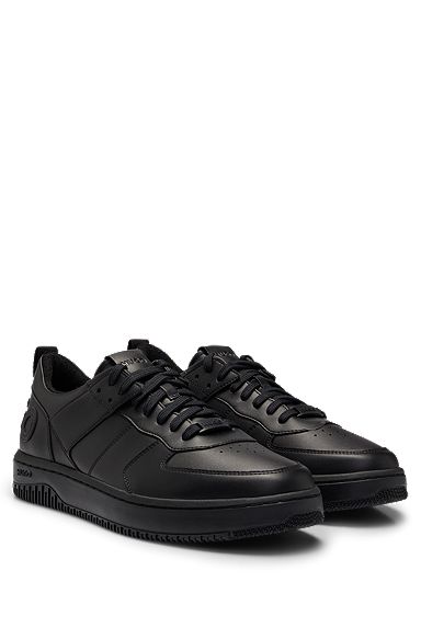 Mixed-material trainers with raised logo, Black