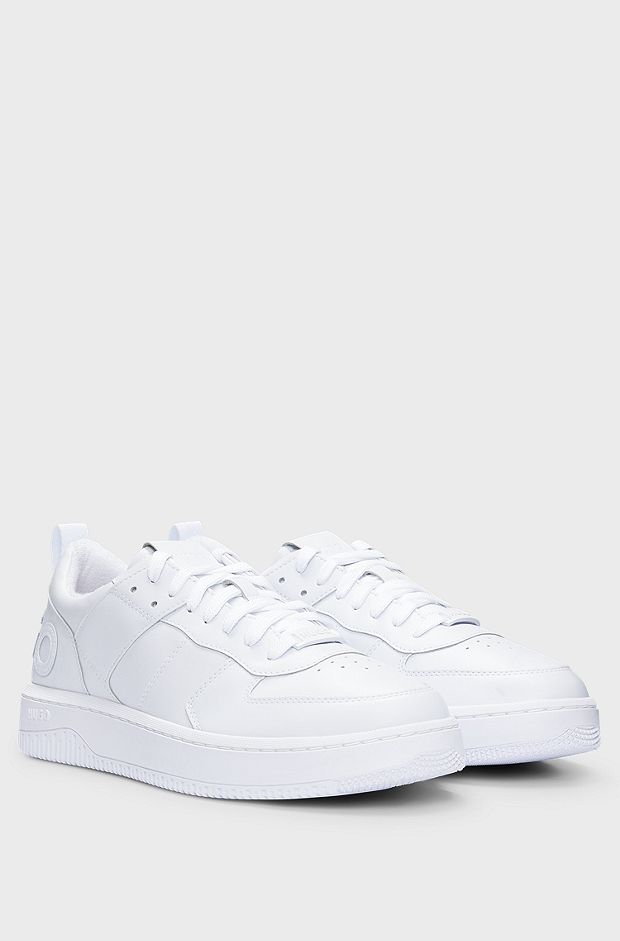Mixed-material trainers with raised logo, White