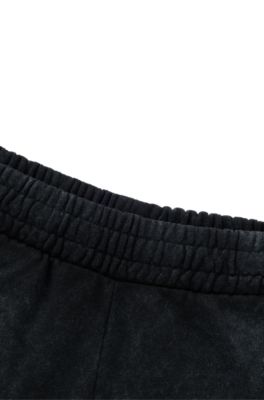 HUGO - Relaxed-fit cargo tracksuit bottoms in a cotton blend