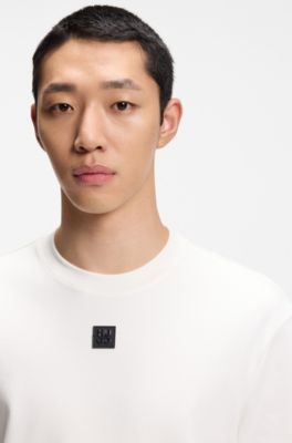 Interlock-cotton T-shirt with metallic stacked-logo badge, Natural