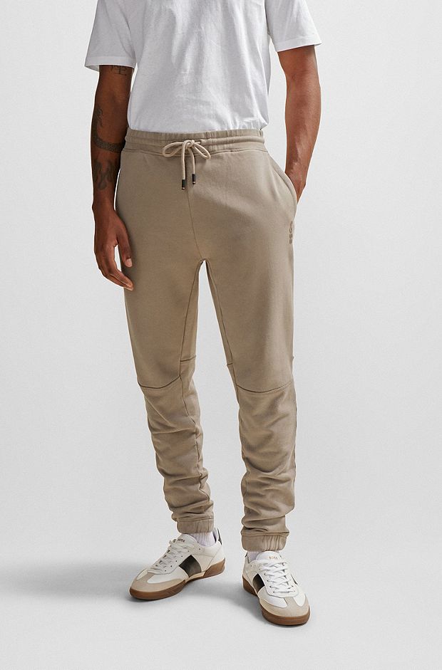 Cotton-terry tracksuit bottoms with logo detail, Beige