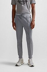 Cotton-blend tracksuit bottoms with pixelated details, Grey