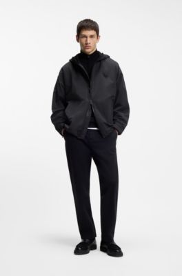 Water-repellent hooded windbreaker with stacked-logo badge, Black