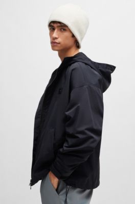 Water-repellent hooded windbreaker with stacked-logo badge, Black