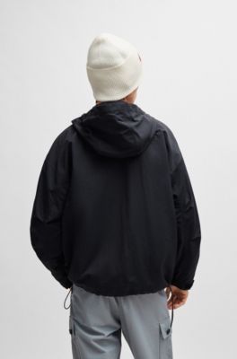 Water-repellent hooded windbreaker with stacked-logo badge, Black