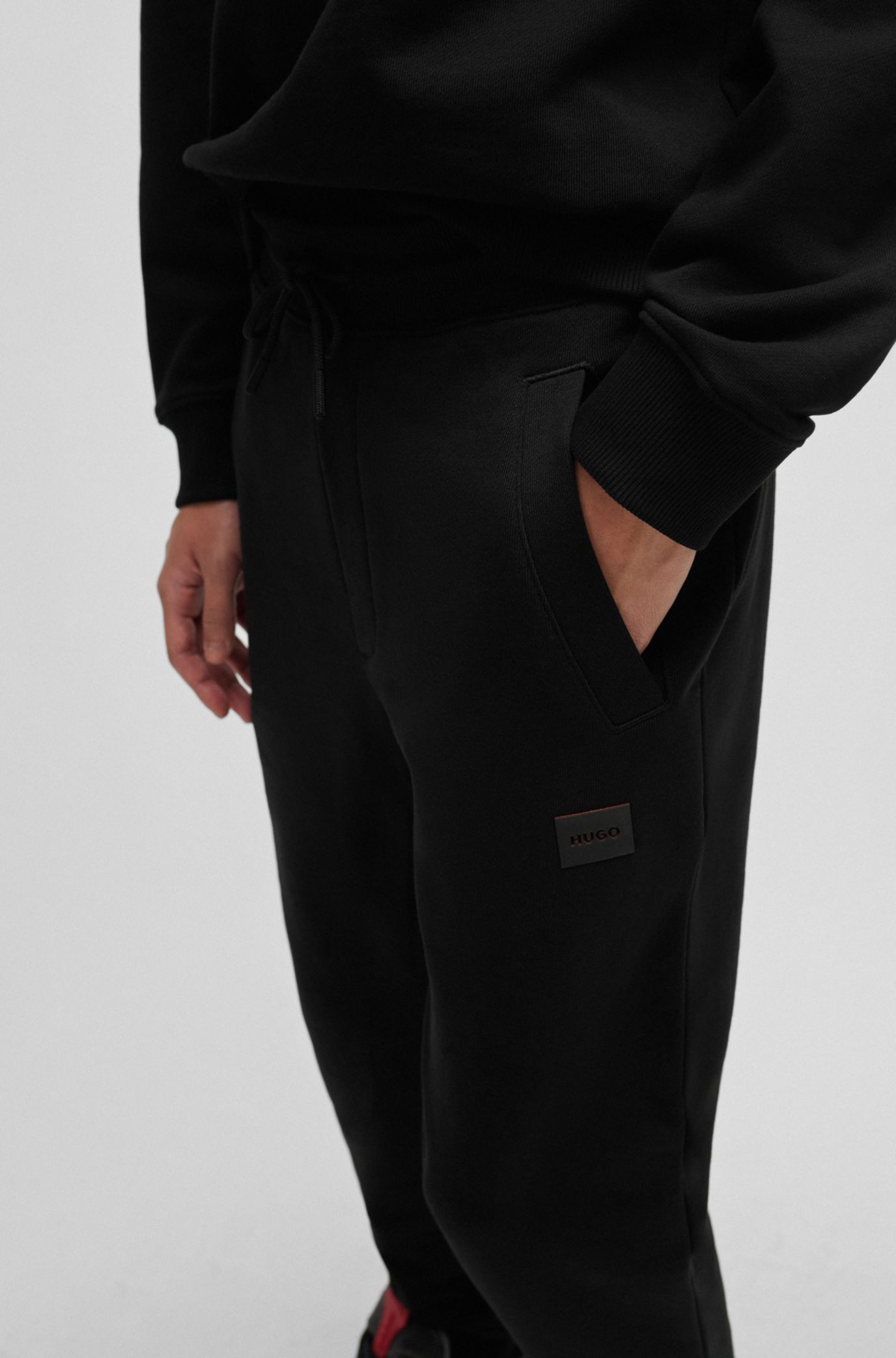 Cotton-terry tracksuit bottoms with logo detail