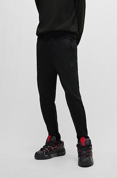 Cotton-terry tracksuit bottoms with logo detail, Black