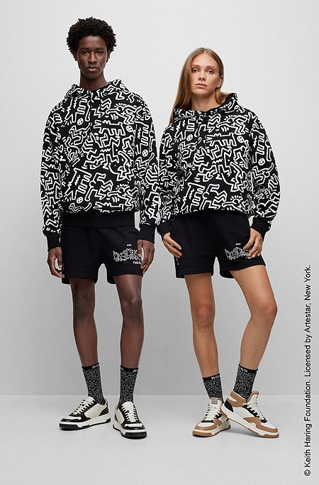 Genderneutraler BOSS x Keith Haring Hoodie aus Baumwolle mit speziellem Artwork, Schwarz gemustert