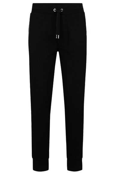 Pantaloni della tuta in misto cotone con dettagli con righe tipiche del marchio, Nero