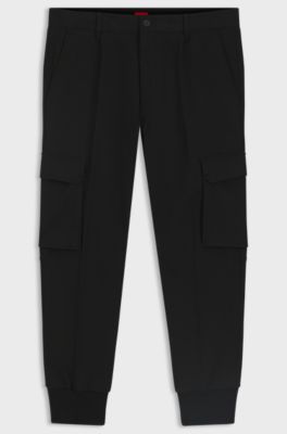 Pantalones tapered fit de tejido de gabardina el&aacute;stico, Negro