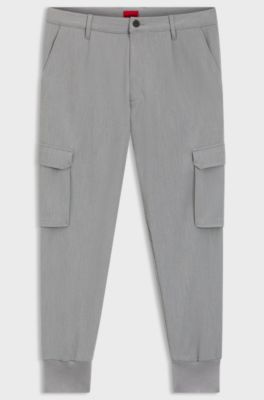 Pantalones tapered fit de tejido de gabardina el&aacute;stico, Gris