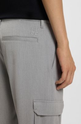 Pantalones tapered fit de tejido de gabardina el&aacute;stico, Gris