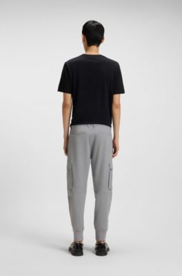 Pantalones tapered fit de tejido de gabardina el&aacute;stico, Gris