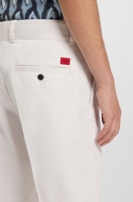 Regular-fit shorts with slim leg and buttoned pockets, Natural