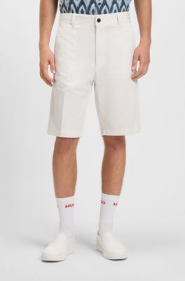Regular-fit shorts with slim leg and buttoned pockets, Natural