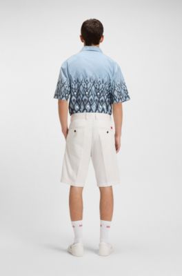 Regular-fit shorts with slim leg and buttoned pockets, Natural