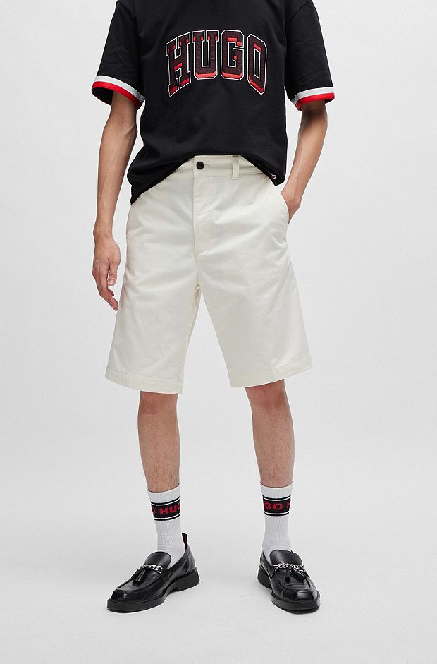 Regular-fit shorts with slim leg and buttoned pockets, White
