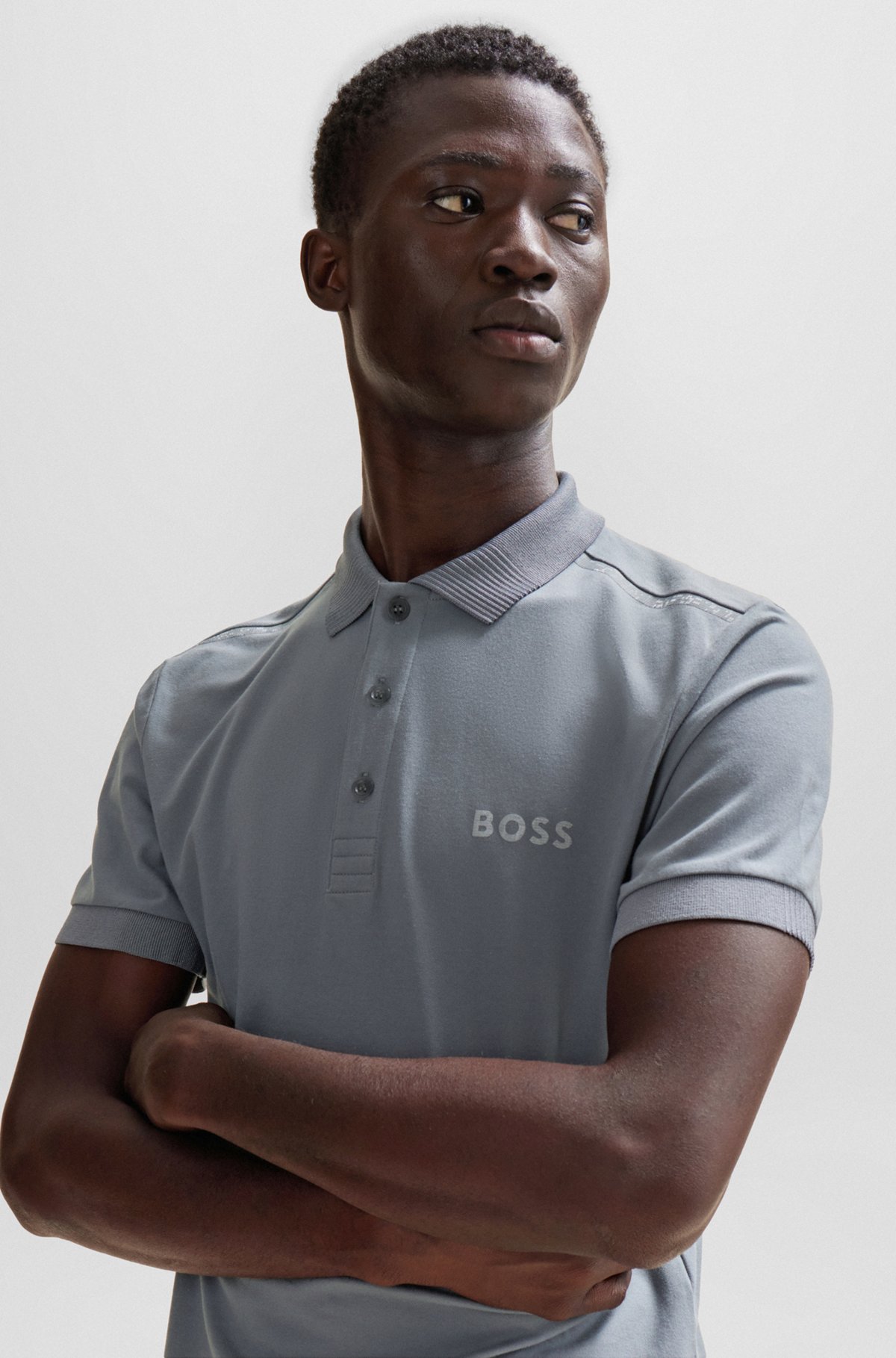 BOSS - Slim-fit polo shirt with decorative reflective details
