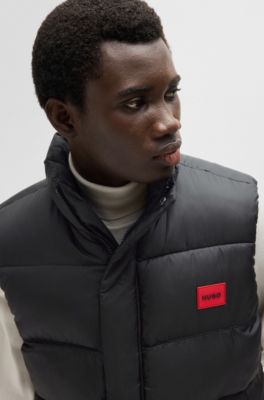 Water-repellent gilet with red logo label, Black