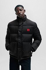 Water-repellent puffer jacket with red logo badge, Black