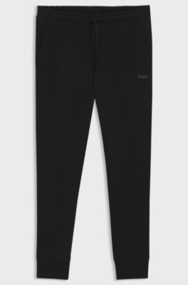 Bas de surv&ecirc;tement en coton stretch avec logo imprim&eacute;, Noir