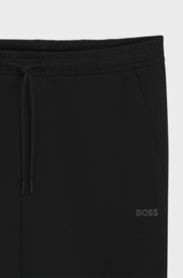 Bas de surv&ecirc;tement en coton stretch avec logo imprim&eacute;, Noir