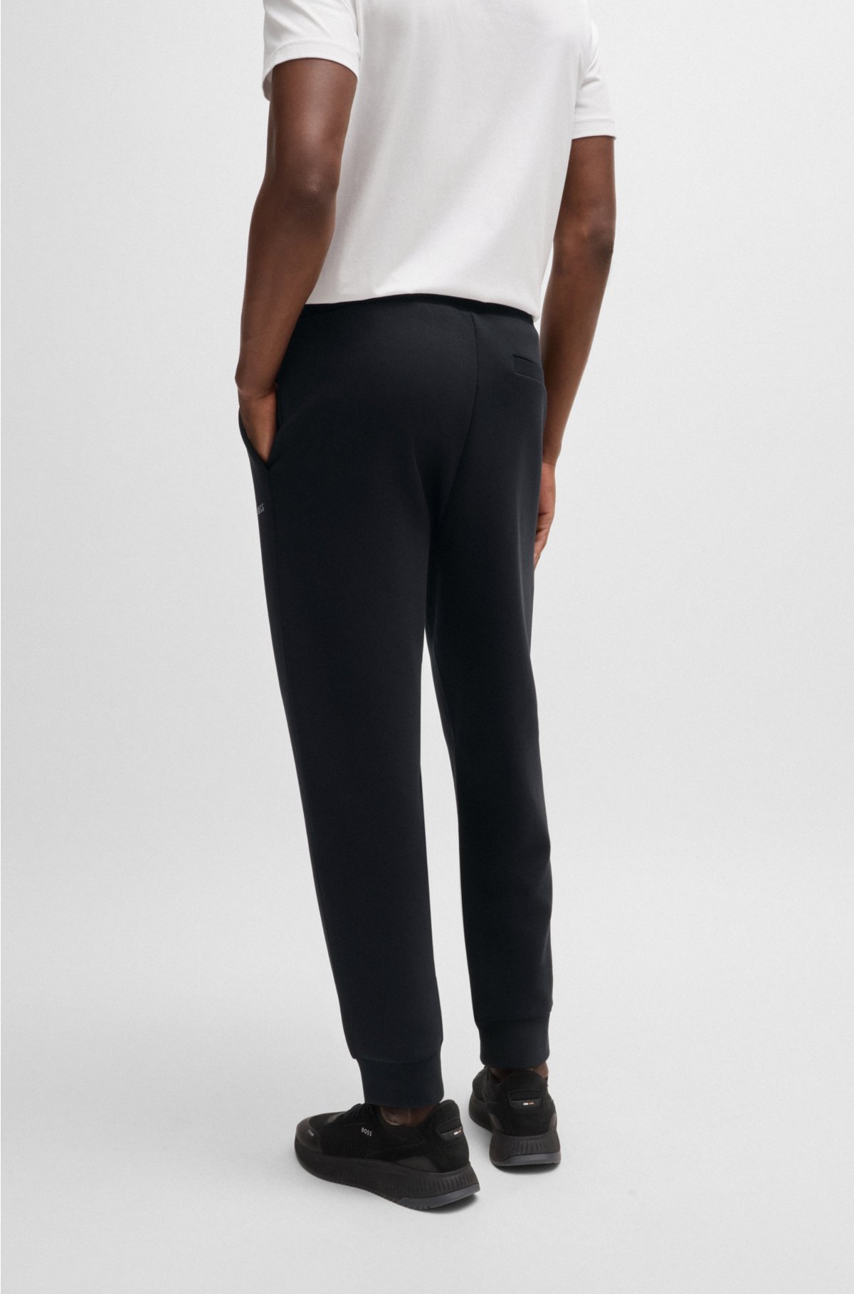 Stretch-cotton tracksuit bottoms with logo print, Black