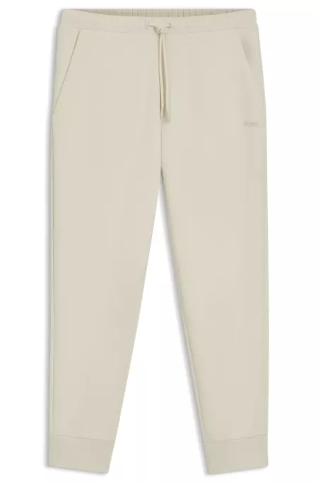 Stretch-cotton tracksuit bottoms with logo print