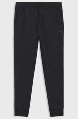 Stretch-cotton tracksuit bottoms with logo print, Dark Blue