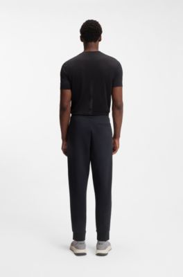 Stretch-cotton tracksuit bottoms with logo print, Dark Blue