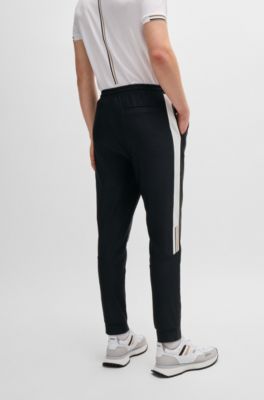 BOSS - BOSS x Matteo Berrettini tracksuit bottoms with contrast tape ...