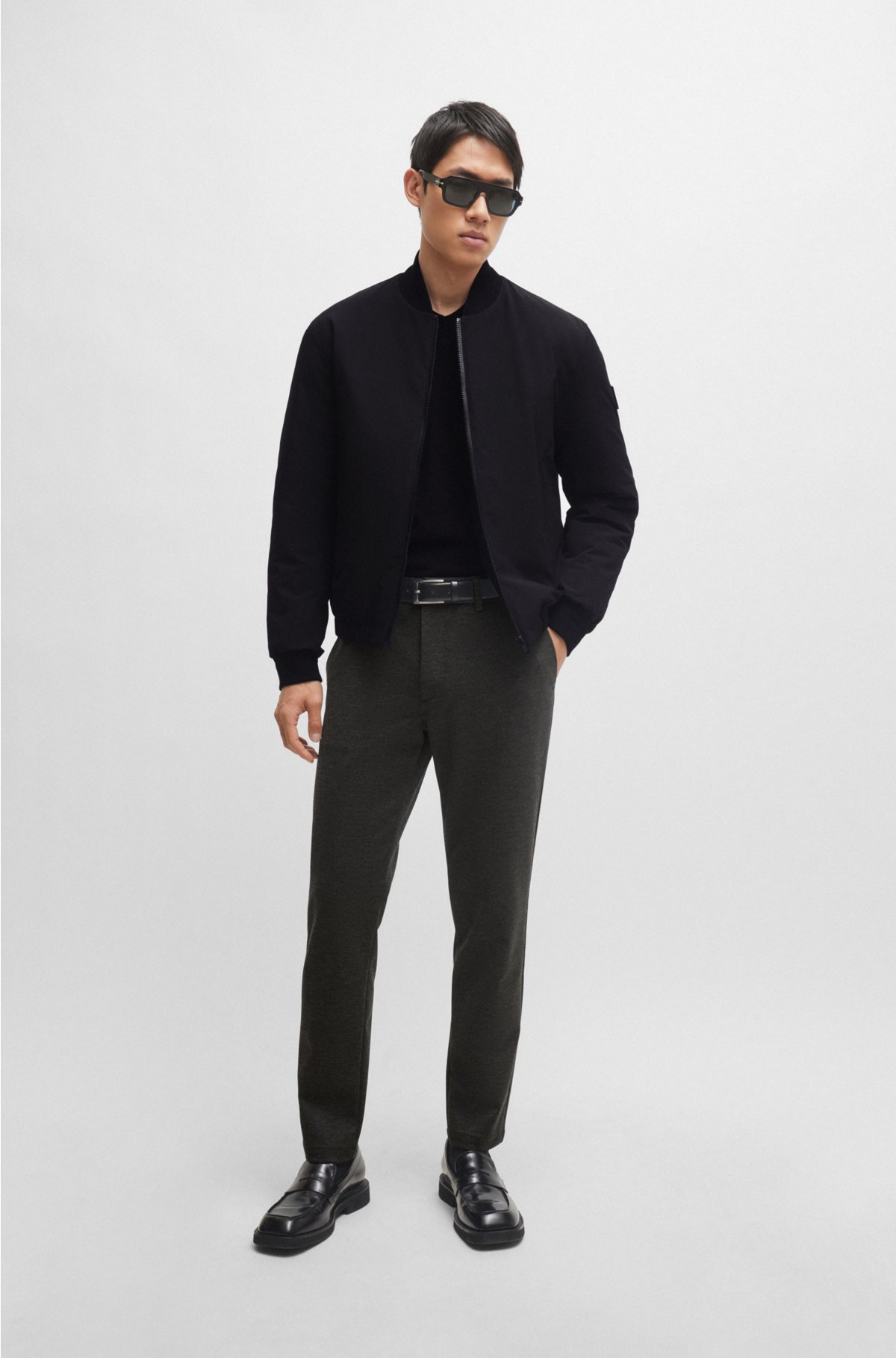Slim-fit trousers in structured performance-stretch material, Black