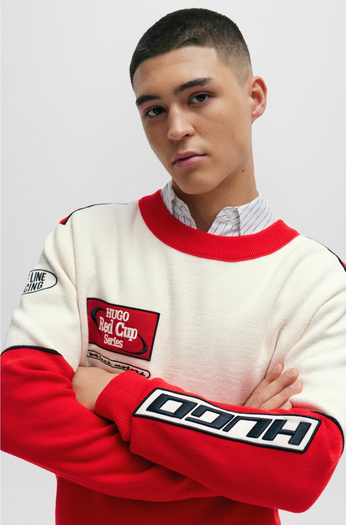 Colour-blocked sweater with racing-inspired badges, Red