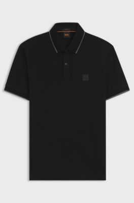Polo slim fit in piqu&eacute; di cotone elasticizzato, Nero