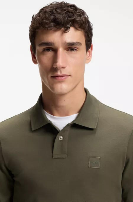 Slim-Fit Poloshirt aus elastischem Baumwoll-Piqué