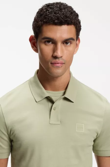 Polo Slim en coton stretch à patch logo