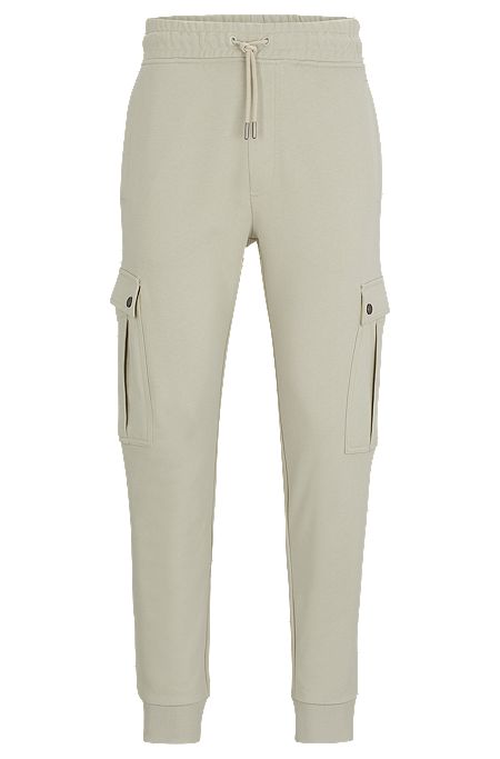 Cotton-terry tracksuit bottoms with cargo pockets, Light Beige