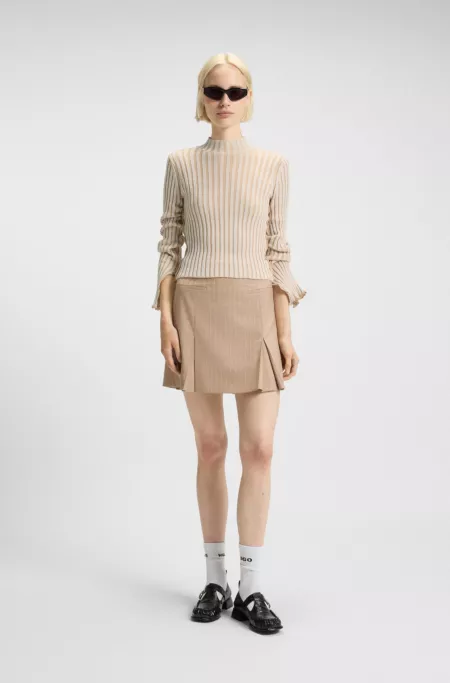 Mock-neck sweater in ribbed cotton with frilled seams