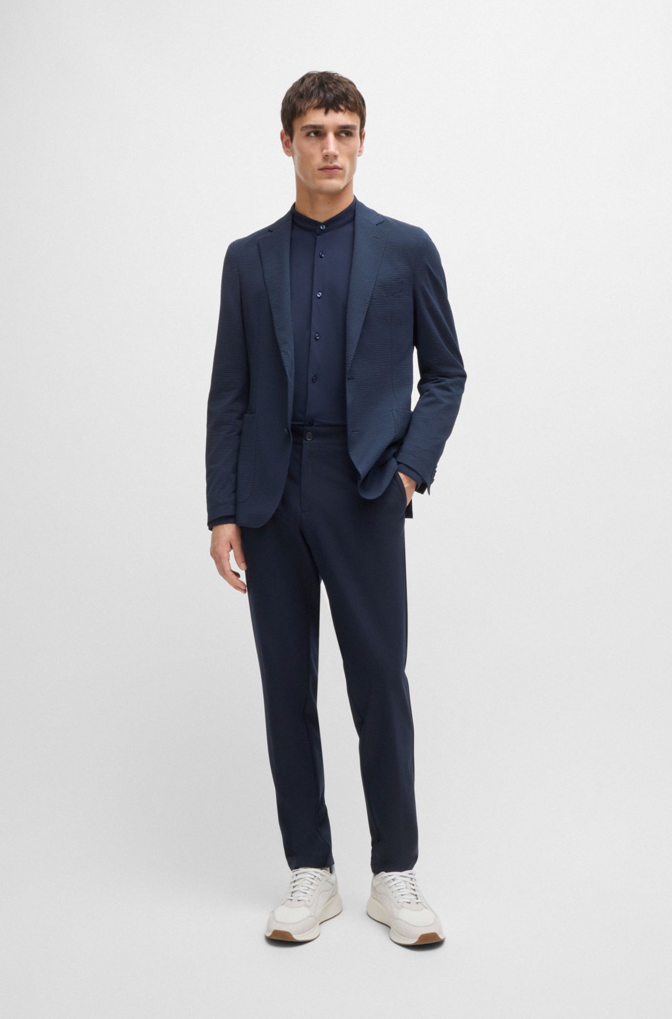 BOSS - Slim-fit trousers in micro-patterned performance-stretch fabric