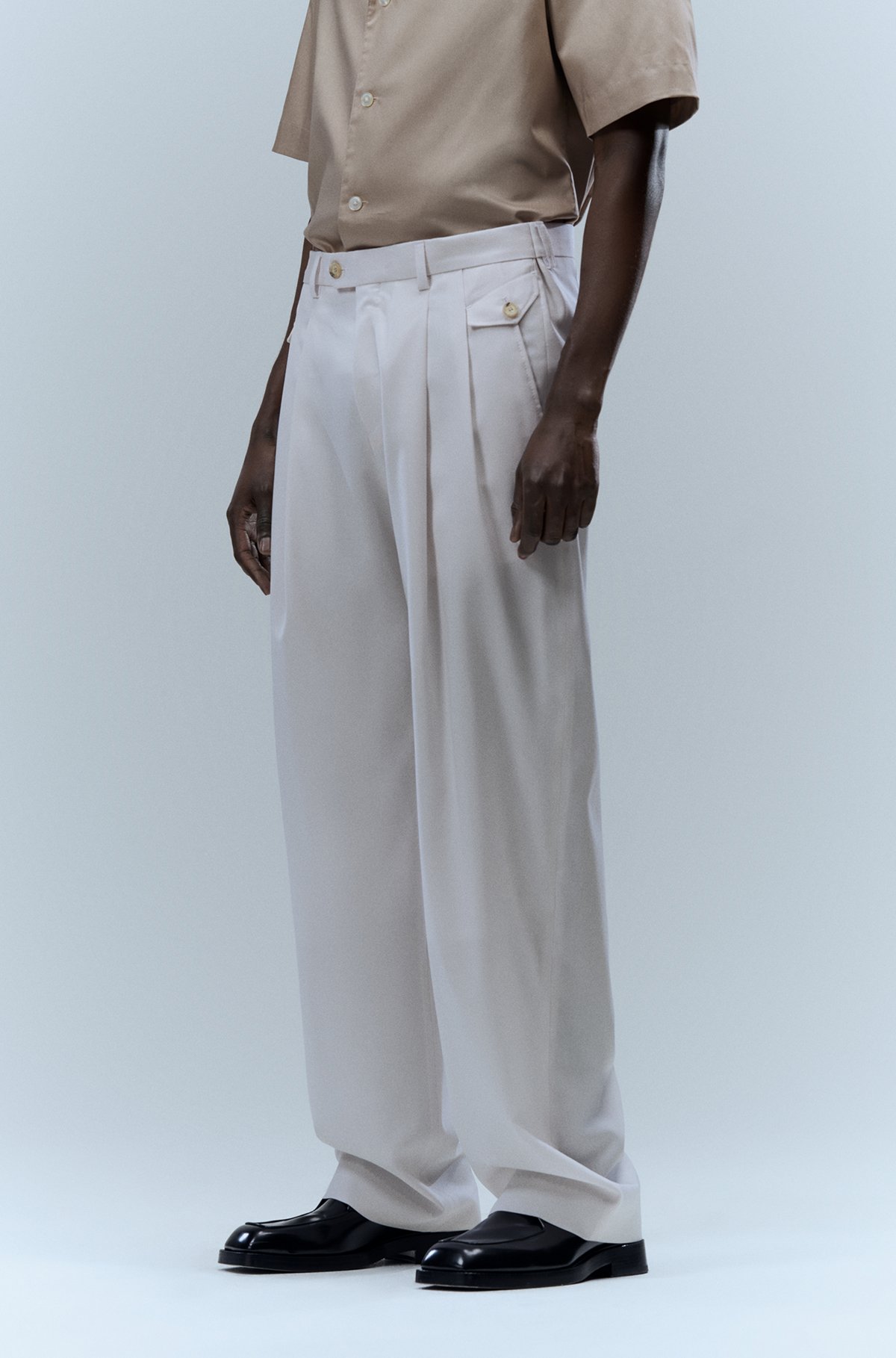 Relaxed-fit trousers in virgin wool with front pleats, White