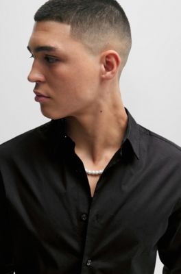 HUGO - Relaxed-fit shirt with Kent collar and flame artwork