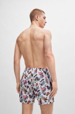 Quick-dry swim shorts with all-over print, White