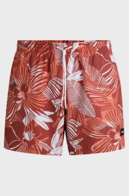 Quick-dry swim shorts with all-over print, Orange