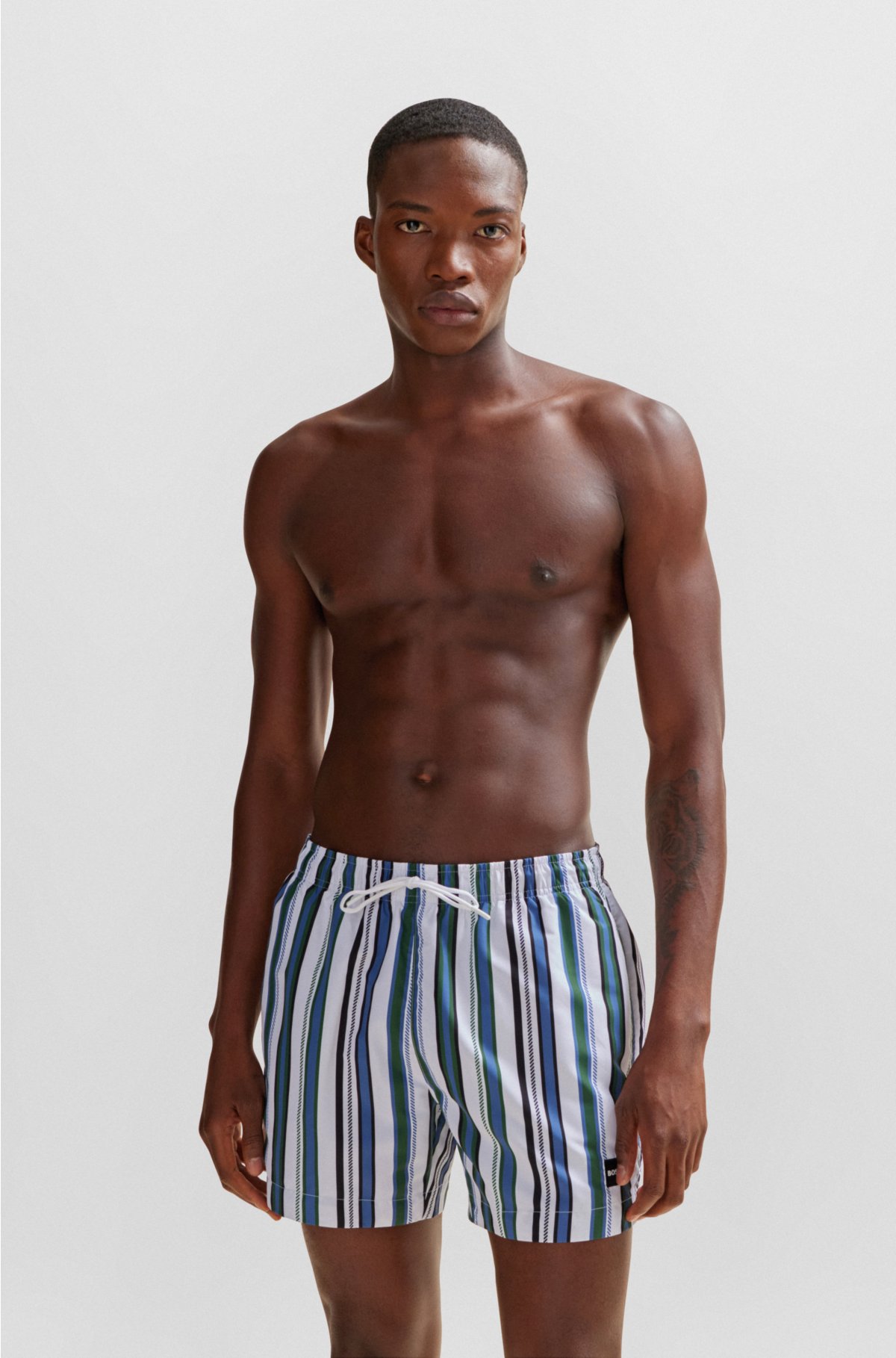 Fully lined swim shorts in striped quick-dry fabric, Black / White / Blue