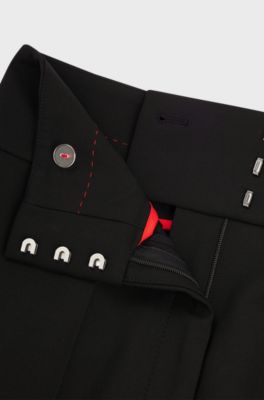 Pantalon large Regular Fit en tissu stretch, Noir