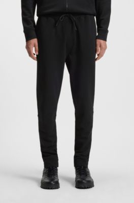 Cotton-terry tracksuit bottoms with logo patch, Black