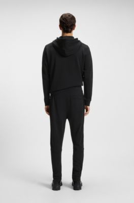 Cotton-terry tracksuit bottoms with logo patch, Black