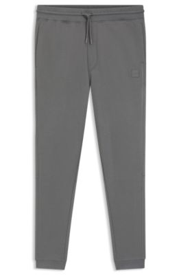 Cotton-terry tracksuit bottoms with logo patch, Grey