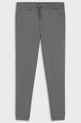 Cotton-terry tracksuit bottoms with logo patch, Grey
