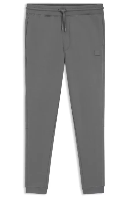 Cotton-terry tracksuit bottoms with logo patch